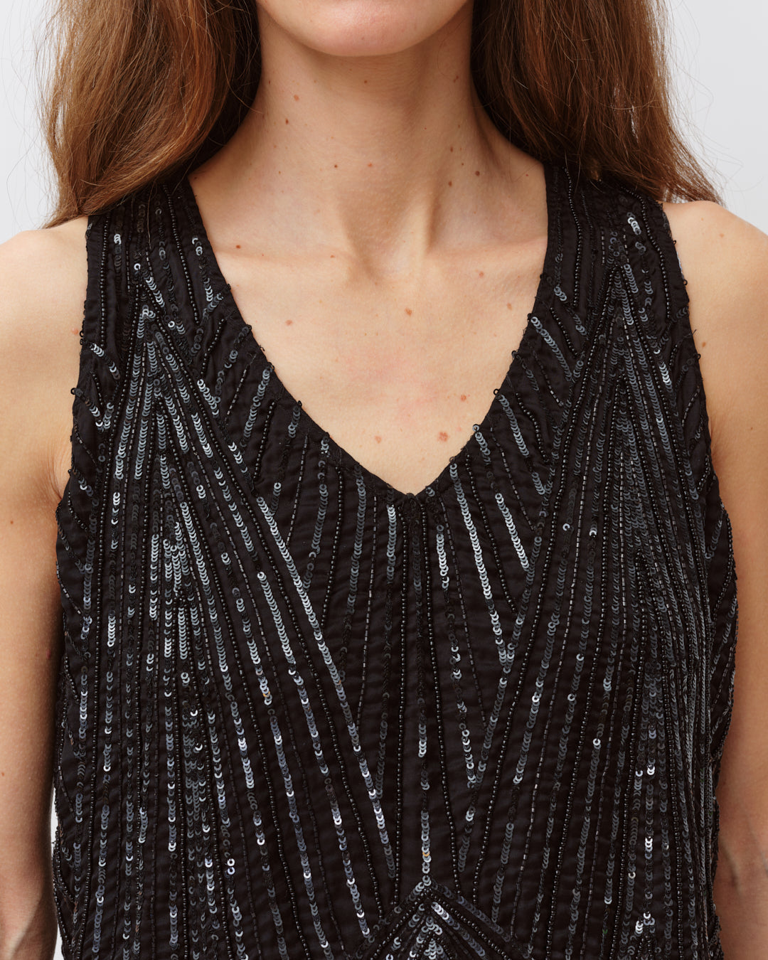 Diega Tawao top noir sans manches à sequins