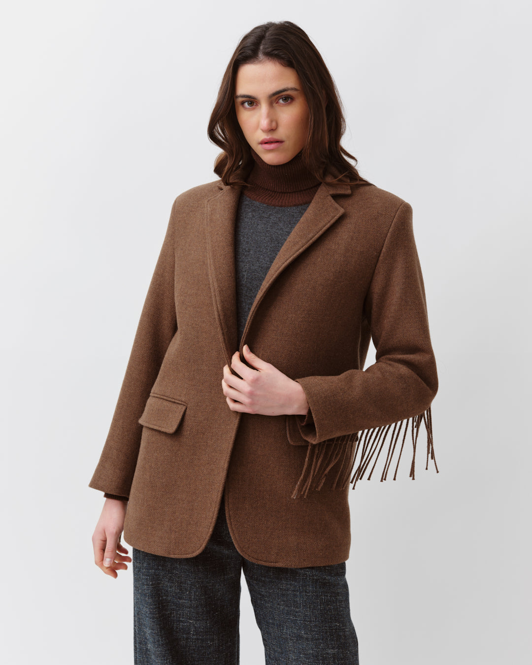 Diega Vozo veste camel laine vierge à franges