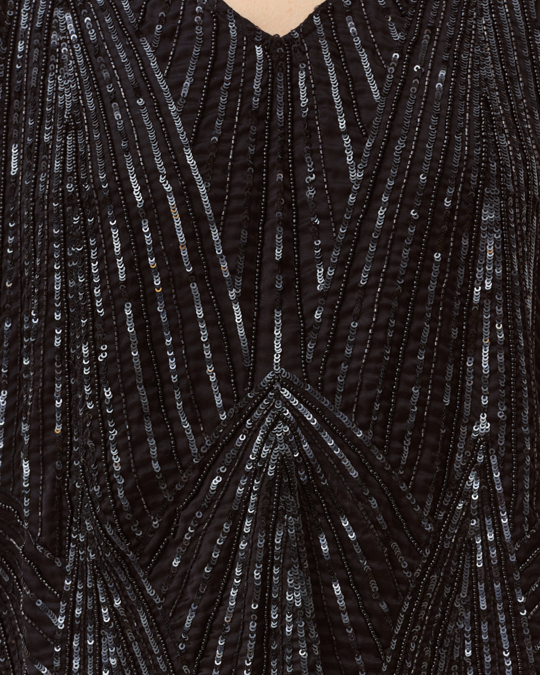 Diega Tawao top noir sans manches à sequins