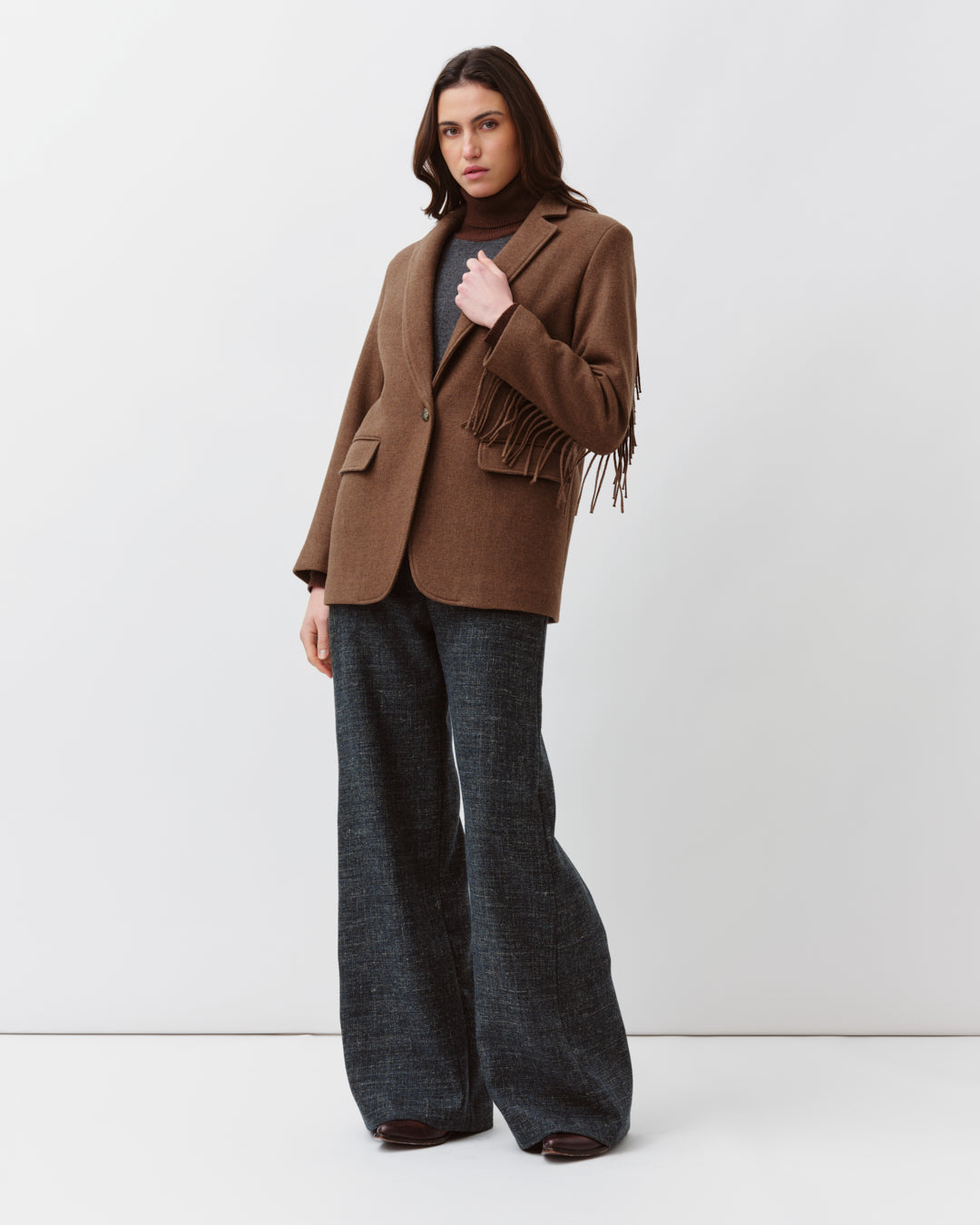 Diega Vozo veste camel laine vierge à franges
